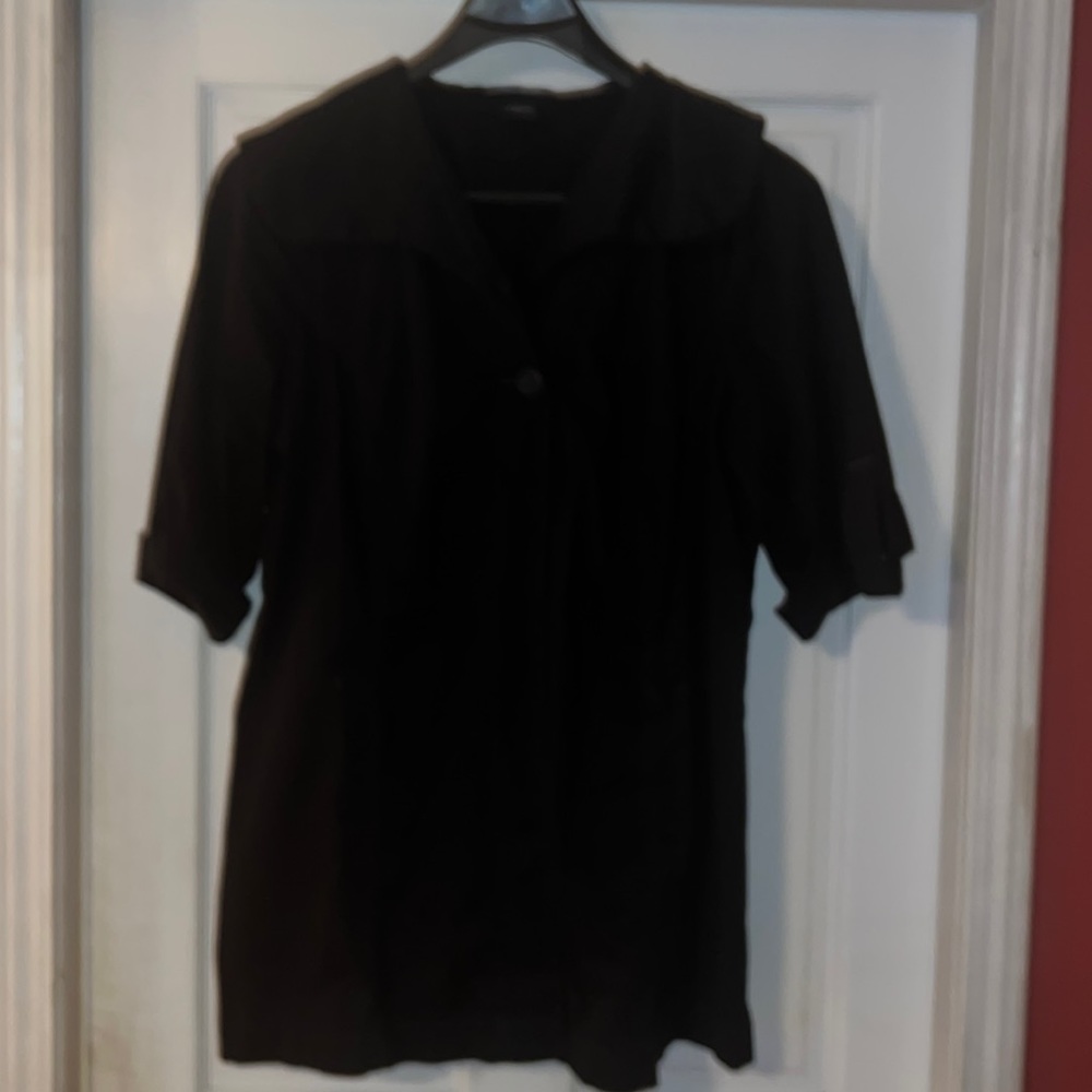 3/4 sleeve coat! Love it!! Lightweight, contemporary and cuffed sleeves.